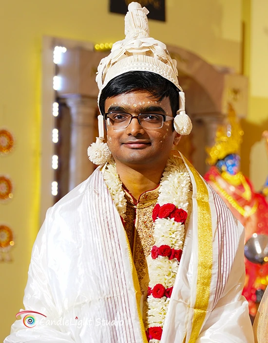 Bengali groom in traditional wedding attire, embodying elegance in CandleLight Studio's Bengali Wedding Photography.